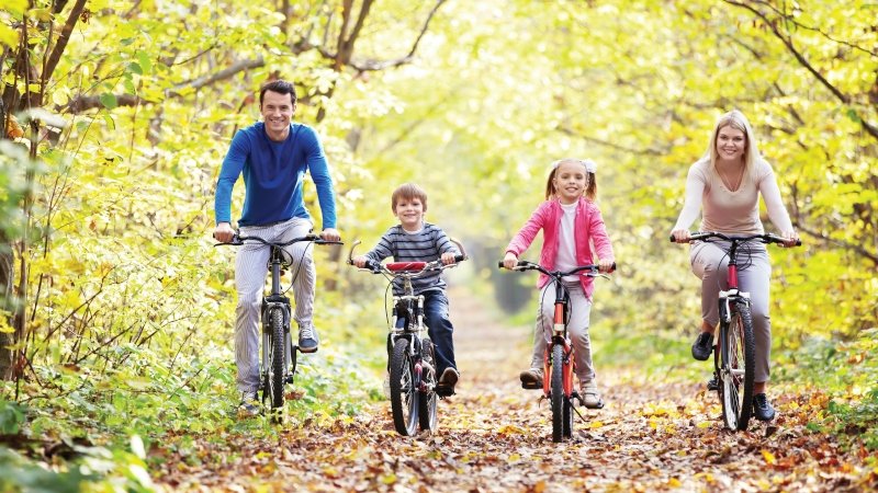 Family cycling shot   inside Castlerosse Hotel